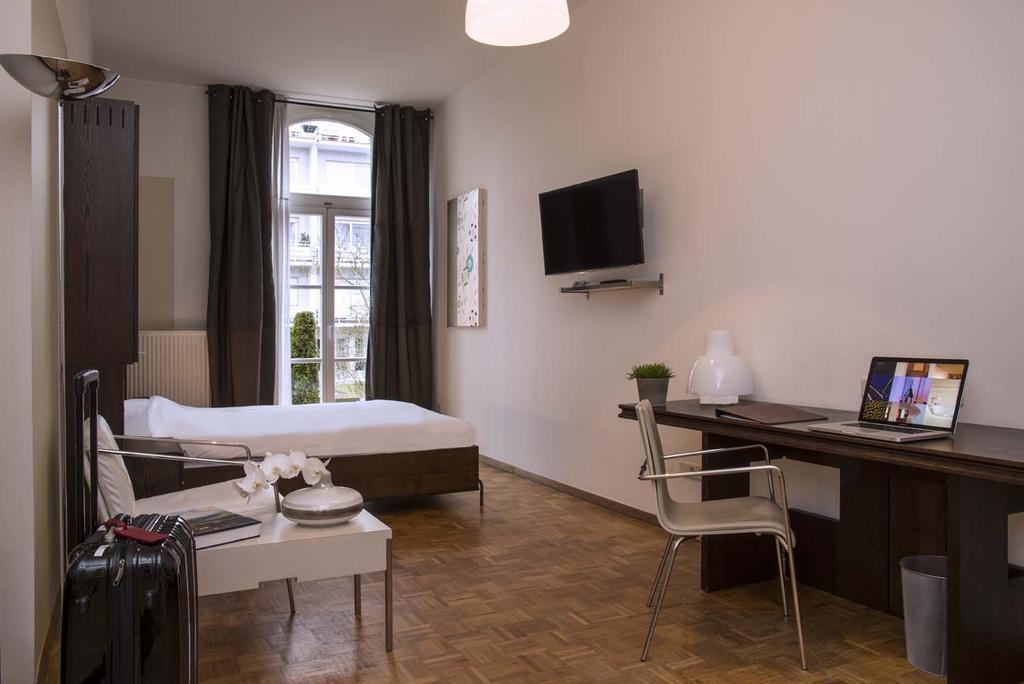 Key Inn Appart Hotel Belair Люксембург Стая снимка